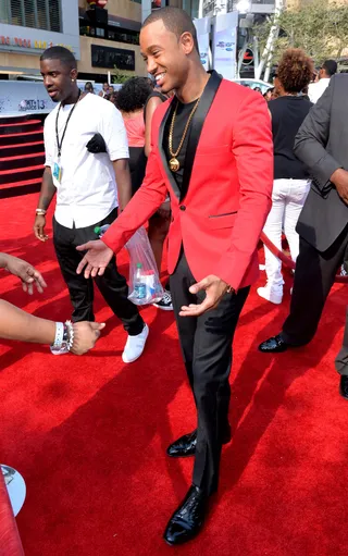 Perfectly Polished - While most opt for white and light ensembles to beat the Los Angeles heat, actor Terrence J looks hot in his red and black suit.  (Photo: Alberto Rodriguez/BET/Getty Images for BET)