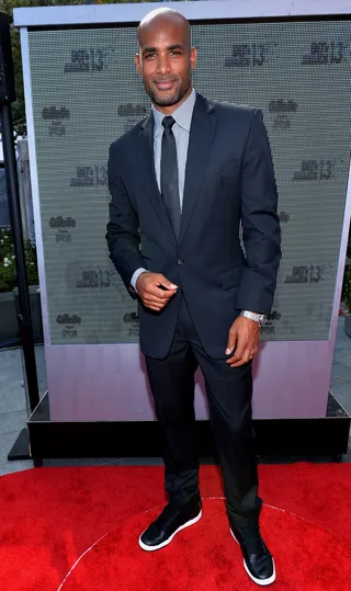 Looking Crisp - Boris Kodjoe represents his own clothing line, Alfa, with a custom-tailored navy suit.  (Photo: Alberto Rodriguez/BET/Getty Images for BET)