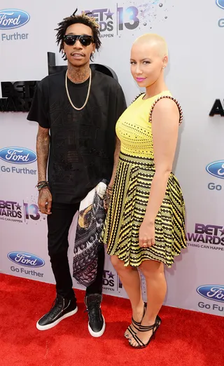 Happy Pair - Wiz Khalifa and his fiancé,&nbsp;Amber Rose, have a date night at the&nbsp;2013 BET Awards. The new parents wear black and yellow, black and yellow, black and yellow.  (Photo: Jason Merritt/BET/Getty Images for BET)