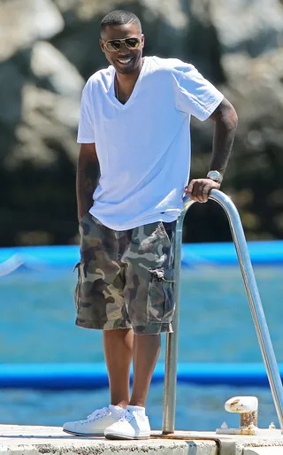 The Good Life - Rapper Nas enjoys time by the pool with friends at the Hotel Du Cap-Eden Roc restaurant in Cap D' Antibes in the South of France.&nbsp;(Photo: WENN.com)