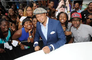 The One and Only  - Best Man Holiday star Terrence Howard chills out with fans on the red carpet.(Photo: John Ricard/Getty Images for BET)