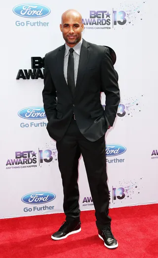 Sharp Suit - Actor Boris Kodjoe, who's always on point on the fashion front, pulls a piece from his own Alfa line of custom-tailored suits.  (Photo: Frederick M. Brown/Getty Images for BET)