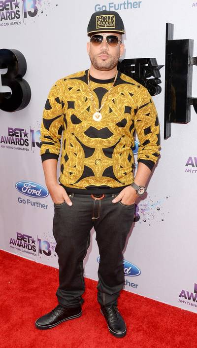 Black and Gold - DJ Drama in a classic black and gold Versace sweatshirt manages to maintain his cool in the California heat.  (Photo: Jason Merritt/BET/Getty Images for BET)