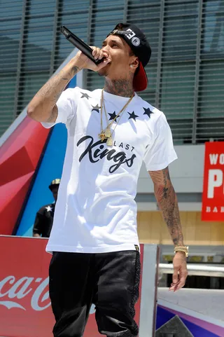 Rack City - Tyga showed love in his hometown, joining Weezy for "Rack City."&nbsp; T-Raw's DJ Mustard-produced single was a nice surprise for the Southern California crowd.&nbsp;&nbsp;(Photo: John Ricard/Getty Images for BET)