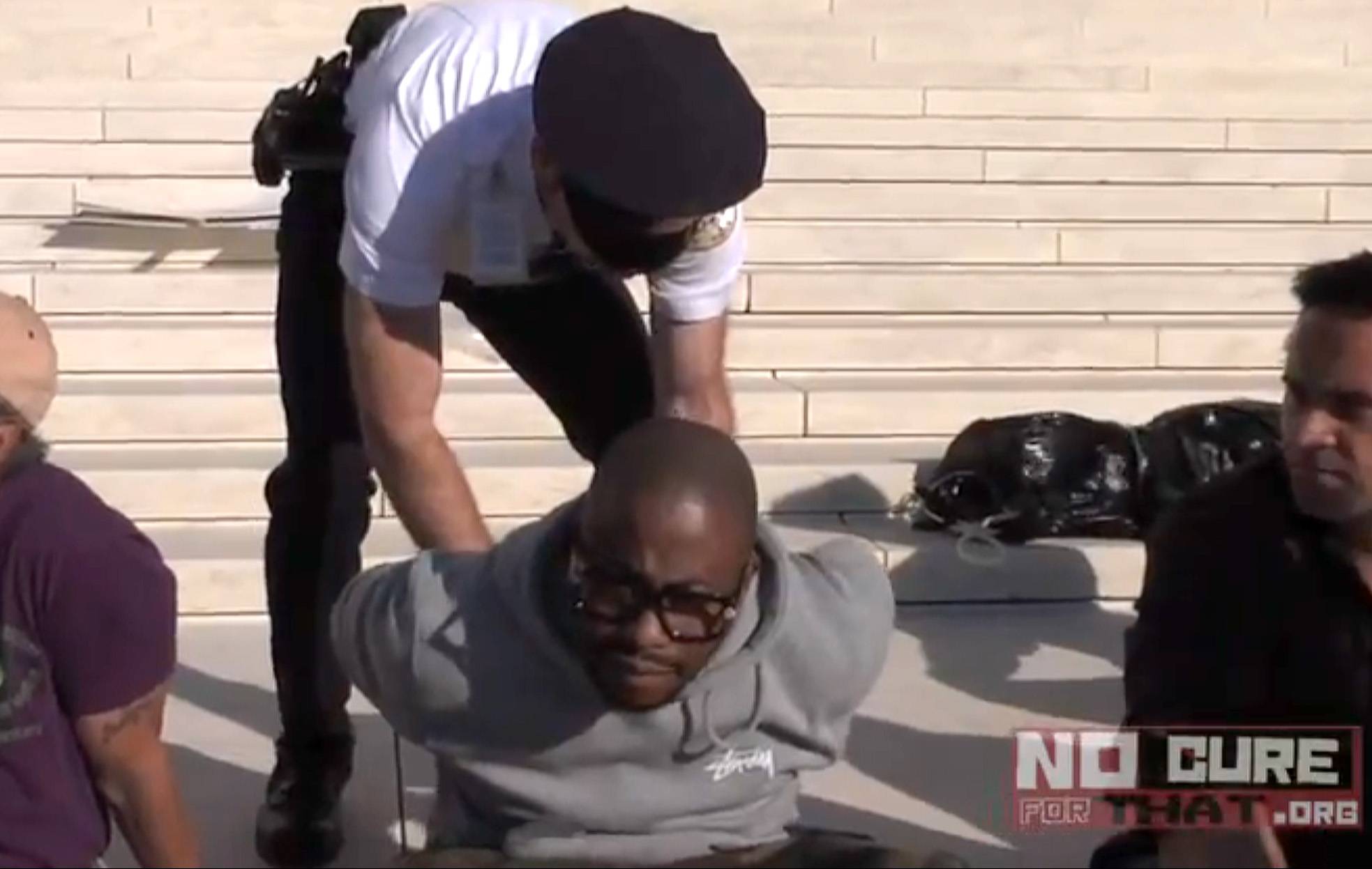 Raheem Devaughn - Washington, D.C.’s homegrown soul singer was arrested alongside Dr. Cornel West on the steps of the Supreme Court while showing his support for the cause. “The message is: Wake up. This can be you. My parents are older, so I have a mom who struggles. It gets tight at times. I have a father who has health issues and battles cancer and wonders if he can pay for his treatment,” he told BET.com. (Photo: Courtesy nocureforthat.org)