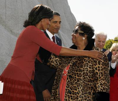 The First Ladies Hug - First Lady Michelle Obama hugs First Lady of Soul, Aretha Franklin. (Photo: REUTERS/Larry Downing)