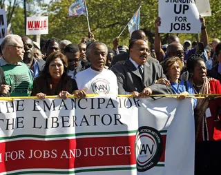 Searching for Jobs - Civil rights and civic leaders, rallying for jobs, lead a march to the new Martin Luther King Jr. Memorial in Washington on Oct. 15, 2011. From right, Rep. Sheila Jackson Lee (D-TX), unidentified, Martin Luther King III, Rev. Al Sharpton and Secretary of Labor Hilda Solis. (Photo: AP Photo/Jose Luis Magana)