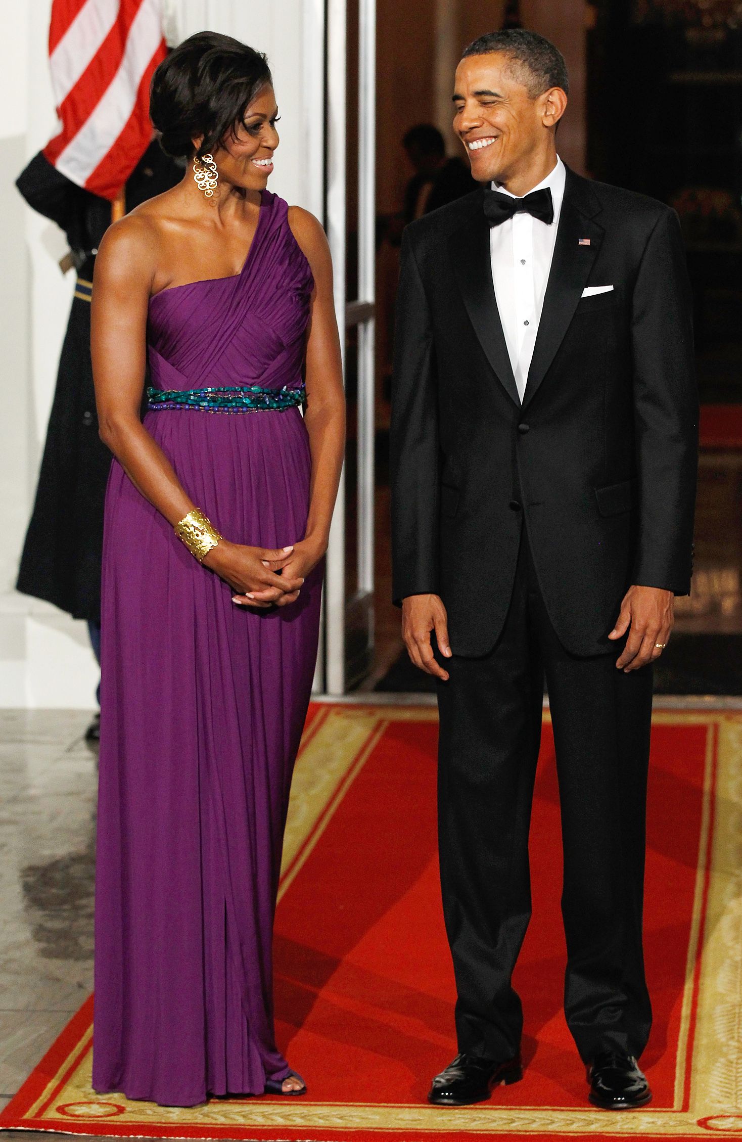Regal Beauty - Doesn't the first lady look regal in purple? The Obamas were set to host the Korean president and first lady at a state dinner on Oct. 13, 2011. (Photo: Alex Wong/Getty Images)