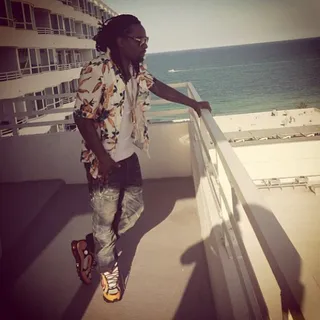 Wale @walemmg - Wale spent his Christmas beach-side. The MMG rapper takes in the view from a hotel balcony.(Photo: Wale via Instagram)