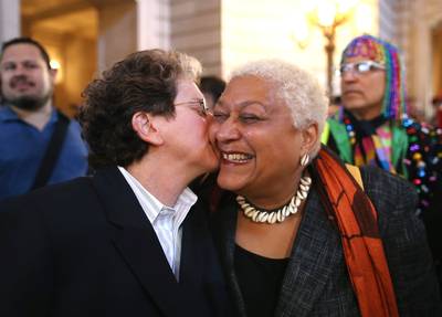 Love the One You Love - A couple celebrates at City Hall in San Francisco after hearing news of the U.S. Supreme Court striking down the Defense of Marriage Act. &nbsp; (Photo: Justin Sullivan/Getty Images)