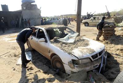 Libya First Suicide Bomb Kills Seven Near Benghazi - Seven people were killed and at least eight were wounded at a security checkpoint near Benghazi when a suicide bomber detonated a truckload of explosives on Sunday. This is the first suicide bomber Libya has seen since the fall of Col.&nbsp;Gaddafi.&nbsp;(Photo: REUTERS/Esam Omran Al-Fetori)