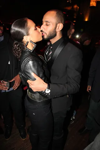 Smooches - Who cares if the cameras are watching! That must be what these two are thinking as they share a tender kiss at the fourth annual Bronx Charter School for the Arts fundraiser.&nbsp;  (Photo: Johnny Nunez/Getty Images)
