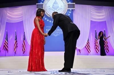 This Girl Is Mine - Obama bows to First Lady Michelle Obama before they dance during the Commander-in-Chief's Inaugural Ball after being sworn in for his second term of office.   (Photo: Chip Somodevilla/Getty Images)