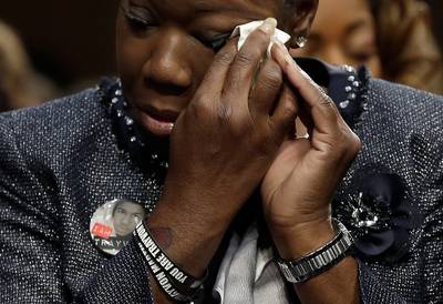 Seeking Answers - Sybrina Fulton, mother of Trayvon Martin, weeps during a Senate Judiciary Committee hearing on the impact of Stand Your Ground laws.&nbsp;&nbsp;(Photo: Win McNamee/Getty Images)