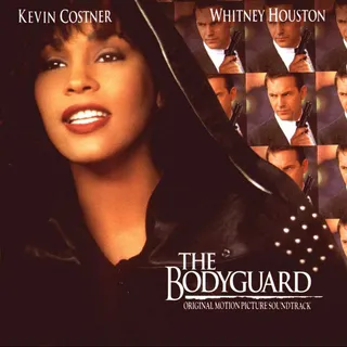 The Bodyguard (1992) - Once established as the reigning queen of pop, next came film offers. Whitney made her big-screen debut in the The Bodyguard. She played Rachel Marron, a star who is stalked by a crazed fan and hires a bodyguard (Kevin Cosner) to protect her. While the movie is a huge hit, the soundtrack yields her acclaimed signiture single &quot;I Will Always Love You.&quot; (Photo: Warner Bros. Pictures)