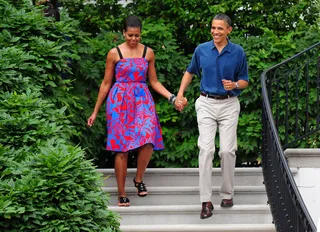 Patriotic Beauty\r - First lady Michelle Obama and President Barack Obama kept it patriotic at their White House Independence Day BBQ.\r\r(Photo: Kevin Dietsch-Pool/Getty Images)