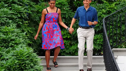 Patriotic Beauty\r - First lady Michelle Obama and President Barack Obama kept it patriotic at their White House Independence Day BBQ.\r\r(Photo: Kevin Dietsch-Pool/Getty Images)
