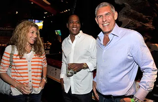 Big Money - Jay-Z drinks it up with Lyor Cohen and Atlantic Records chairman Julie Greenwald.(Photo: Kevin Mazur/WireImage)