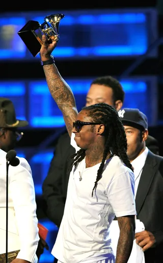 Lil Wayne - "Georgia Bush"  - In a rare moment, New Orleans native Lil Wayne released “Georgia,” a mixtape track that critiqued President Bush’s response to Hurricane Katrina. Weezy initially wanted to perform the song at the Grammys the year he won Best Rap Album of the Year but, for whatever reason, opted for a less politically-charged song.   (Photo by Kevin Winter/Getty Images)