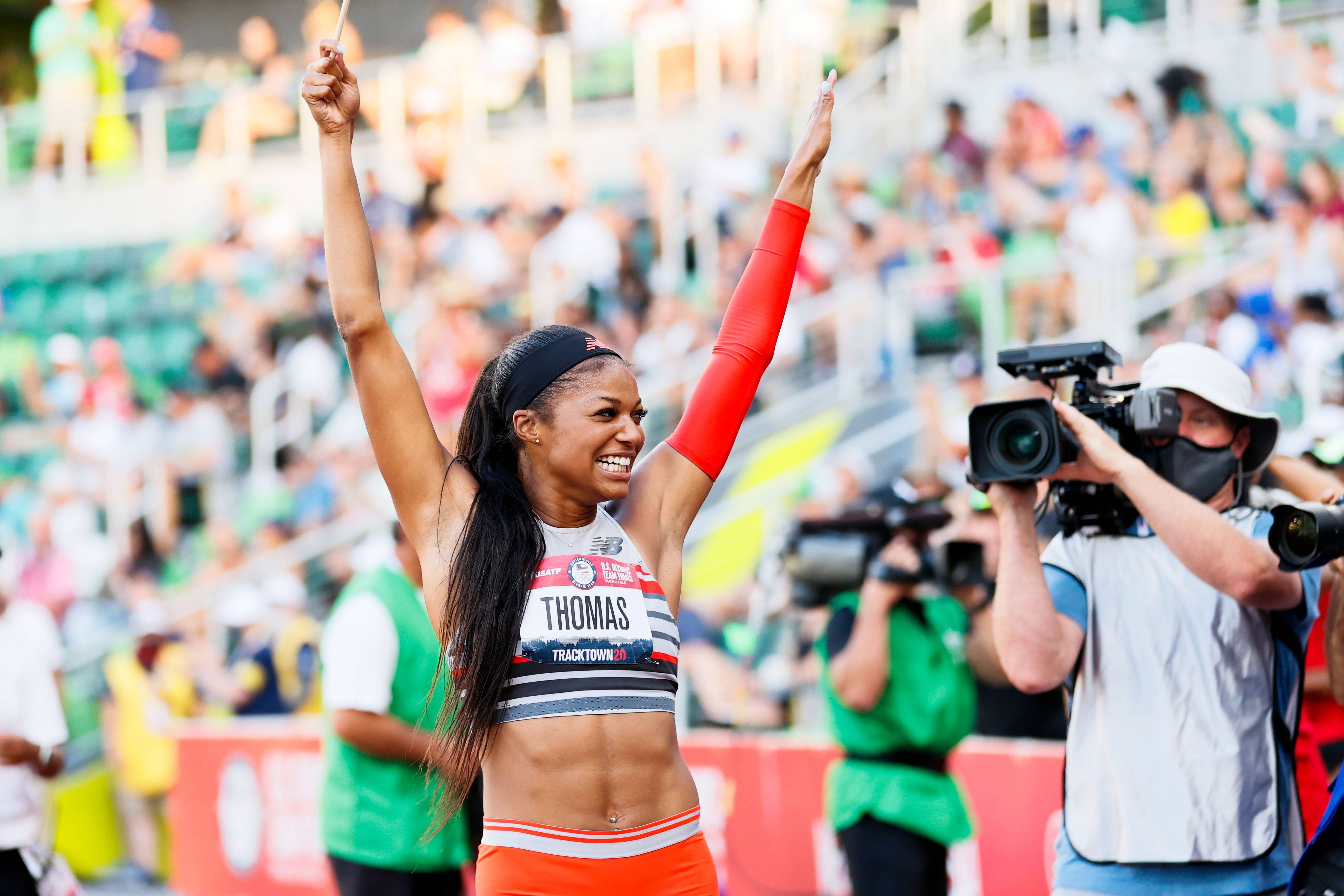 EUGENE, OREGON - JUNE 26: Gabby Thomas crosses the finish line to win the Women's 200 Meters Final on day nine of the 2020 U.S. Olympic Track & Field Team Trials at Hayward Field on June 26, 2021 in Eugene, Oregon. (Photo by Steph Chambers/Getty Images)