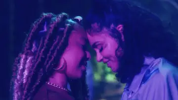 R&B singer-songwriters Kiana Ledé and Kehlani share a passionate kiss in the music video for their sensual track "Ur Best Friend" on BET Jams 2021.