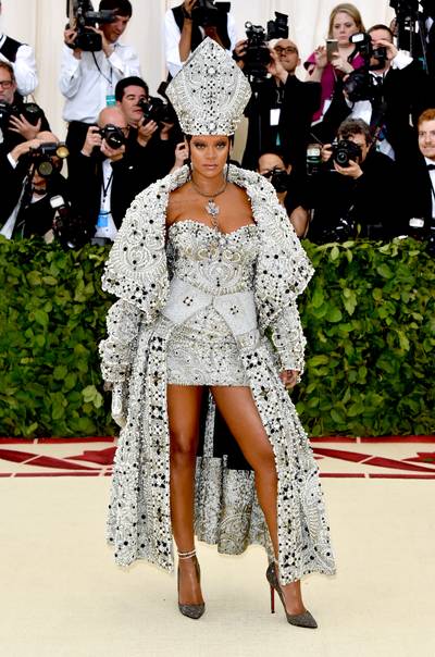 2018: Heavenly Bodies: Fashion and the Catholic Imagination - In 2018, Rihanna wowed fans when she arrived to the MET Gala&nbsp;in an elaborate pearl and jewel-encrusted robe, which she paired with a matching papal mitre and necklace.&nbsp;(Photo by John Shearer/Getty Images for The Hollywood Reporter) (Photo by John Shearer/Getty Images for The Hollywood Reporter)
