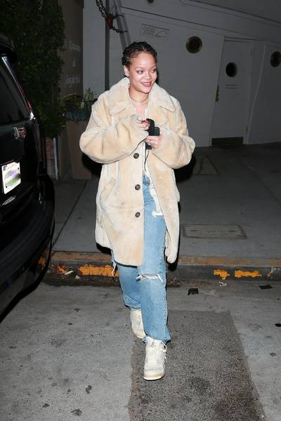 Casual Flex - Rihanna&nbsp;keeps it low key as she leaves dinner at L.A.'s hot spot, Giorgio Baldi. The singer was all smiles as she headed to her car in a tan fur coat over a button down shirt and ripped jeans. She sported the Off White Air Jordan 4's and her hair was in corn rows. Her skin is flawless. We've never seen anyone look this good in jeans and sneakers! (Photo: Backgrid)