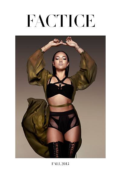 Karrueche Tran on Factice  - Kae’s modeling resume keeps on expanding. Here she is striking a powerful pose for the French fashion mag sporting a sexy cutout crop top, high-waisted briefs and a dramatic olive cape.  (Photo: Factice Magazine, Fall 2015)