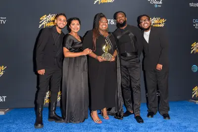 Maverick City secured their award wearing sleek and polished black ensembles. - (Photography By Gip III for Central City Productions) (Photography By Gip III for Central City Productions)