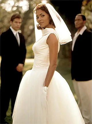 The Wedding (1998) - Winfrey produced this television movie starring Halle Berry as a woman torn between two men and under scrutiny for an interracial relationship in 1950s Martha's Vineyard. Winfrey's Women of Brewster Place co-star Lynn Whitfield also stars.&nbsp;  &nbsp;(Photo: ABC)