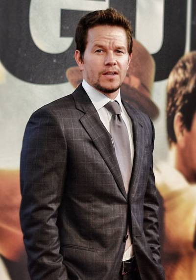 Mark Wahlberg - The Pain and Gain star may be worth an estimated $165 million today, but the actor once had to survive on quite a few less zeros. Wahlberg was the youngest of nine children and raised in poverty in Boston. At age 16, he served 50 days in prison for assaulting two men after a drug deal went bad. This was rock bottom for Wahlberg, and he was determined to turn his life around. A short time later, with the help of his brother, Donnie Wahlberg, his music career was born.(Photo: Neilson Barnard/Getty Images)
