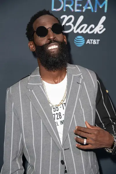 Tye Tribbett deserved an applause for his mismatched pinstripe suit.&nbsp; - (Photography By Earl Gibson III) (Photography By Earl Gibson III)