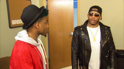 Big Leagues - Nelly gives Lil' Shawn and Shad of JGE Retro some encouragement backstage. (Photo: BET)