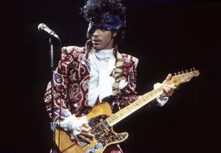 Prince onstage during the 1984 Purple Rain Tour