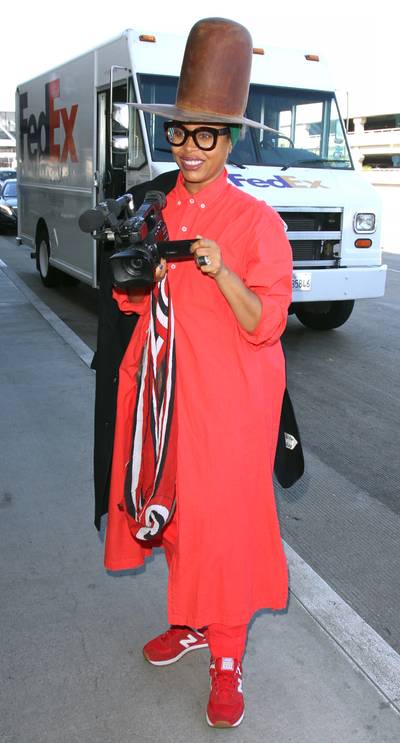Mad Hatter - No one does funky airport style like Erykah Badu. Look at that hat!(Photo: WENN.com)