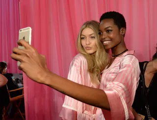Selfie Time - Pouty lips? Check. Megawatt smile? Check. Gigi Hadid and Maria Borges have the selfie game on lock.  (Photo: Kevin Mazur/WireImage)