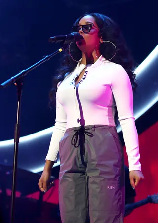 H.E.R. performs at the BET Experience. - (Photo by Ser Baffo/Getty Images for BET)&nbsp;