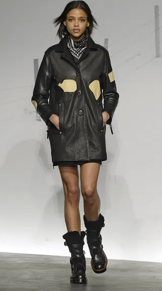 Coach - Statement patches and a leather exterior give this overcoat a cool rocker vibe. Do add rugged booties and a print neckerchief for the full effect.(Photo: Catwalking/Getty Images)