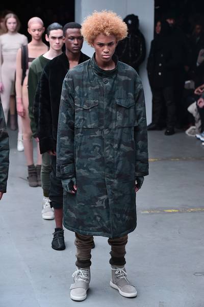 Kanye West x Adidas Originals - Don?t second-guess it: your man needs this camo overcoat in his repertoire.&nbsp; (Photo: Theo Wargo/Getty Images for adidas)