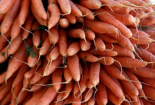 More the Merrier - Rhubarb and carrots (and other root vegetables) also fare well during the winter months. (Photo: Matt Cardy/Getty Images)