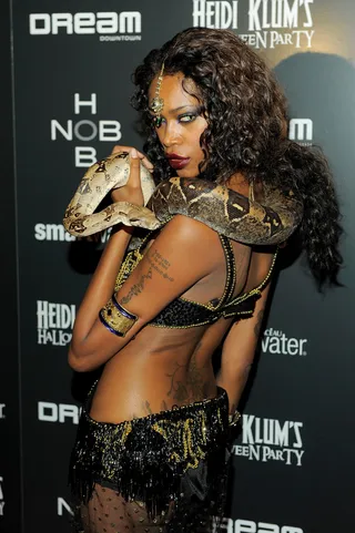 Snake Charmer - Jessica White as a serpent queen with live snake in tow at Heidi Klum's 12th annual Halloween party at the PH-D Rooftop Lounge at Dream Downtown in New York City. (Photo: Jemal Countess/Getty Images)