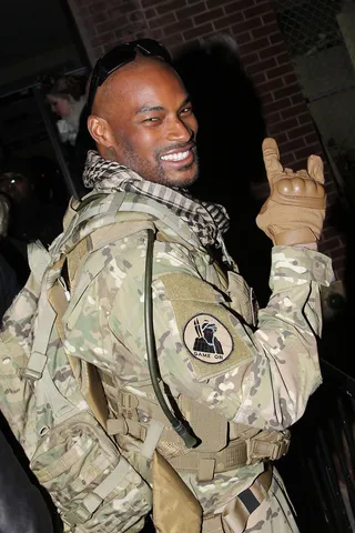 Military Men - Tyson Beckford in full camou gear arrives at Victoria's Secret model Miranda Kerr's Halloween party at Catch Roof in New York City. (Photo: Rob Kim/Getty Images)