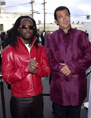 Poppin' Collars - Remember when popping your collar was cool? Wyclef had the style with his red leather jacket while Steven Seagal rocked an Asian-influenced top at the Soul Train Awards. (Photo: Gregg DeGuire/WireImage)