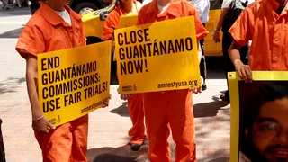 Guantanamo Hunger Strikers Have Hopes Dashed - Detainees on hunger strike at Guantanamo Bay prison say they are &quot;devastated&quot; after learning that the military prison would not be closed. The strikers are refusing food as a method of raising awareness about their plight.  (Photo: Spencer Platt/Getty Images)