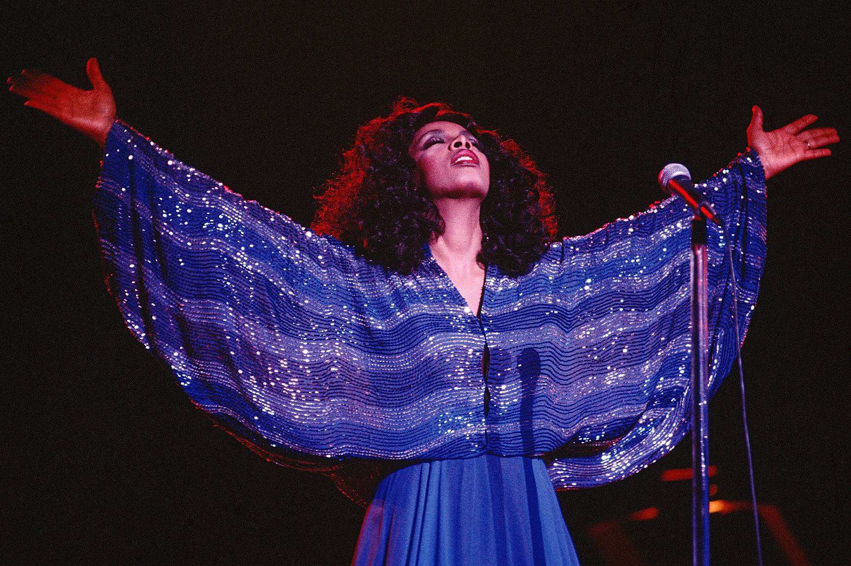 Blue Majesty - On stage, Summer was a sight to behold as she was back in 1979 in this shimmering blue dress.  (Photo: Michael Ochs Archives/Getty Images)