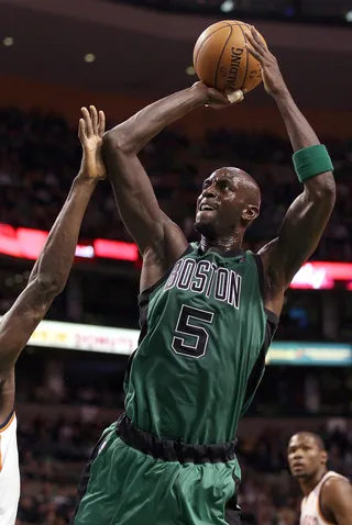 Kevin Garnett - At 6'11&quot;, Kevin Garnett is a veteran power forward and center for the Boston Celtics. He does a bit of trash-talking on the court, but he has the game to back it up for sure!&nbsp; (Photo: Elsa/Getty Images)