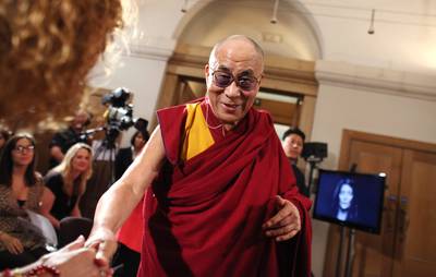 Dalai Lama Gives $1.7 Million Prize to Charity - Tibetan spiritual leader, the Dalai Lama, recently received the annual Templeton Prize in London for exceptional contributions to &quot;affirming life's spiritual dimension.” Shortly after receiving the $1.7 million prize, the 76-year-old spiritual leader said he would give the entire prize to various charities.&nbsp;     &nbsp;(Photo:&nbsp; Oli Scarff/Getty Images)