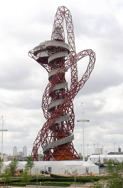 London Installs “Godzilla of Public Art”&nbsp; - The ArcelorMittal Orbit looms over London’s Olympic Park and is the tallest sculpture in Great Britain. But not everyone is pleased with the work of art, some calling the red, twisted contraption “the Eye-ful Tower” and “the Godzilla of public art.”  (Photo: Christopher Lee/Getty Images)