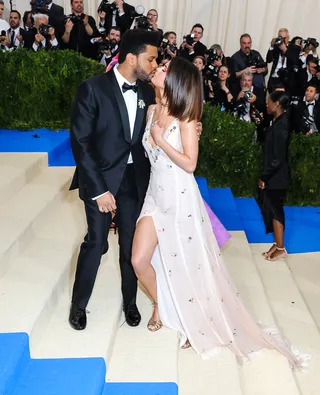 The Weeknd and Selena Gomez - The Weeknd and Selena Gomez&nbsp;shared a kiss for the cameras while at the 2017 Met Gala.&nbsp;(Photo: WENN.com)