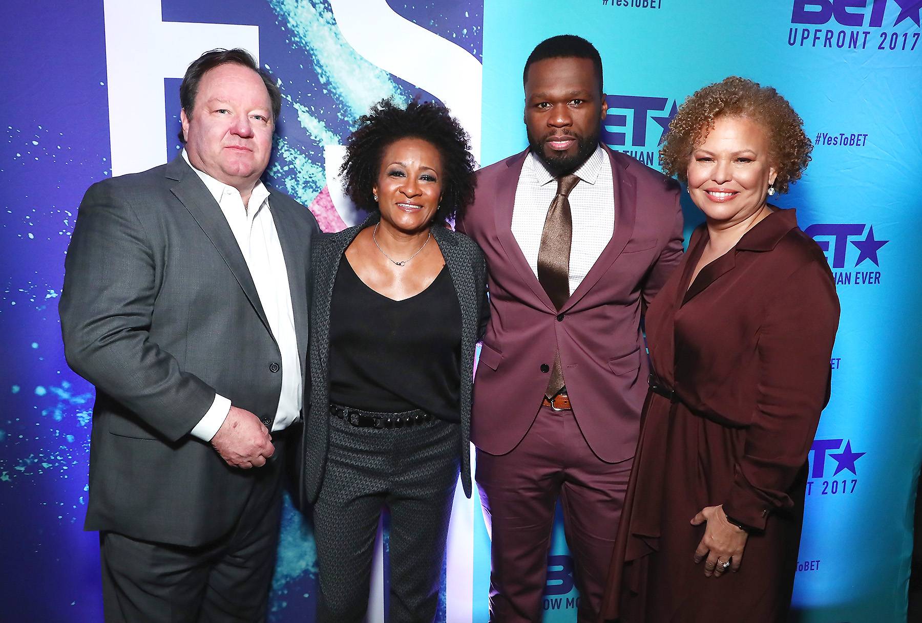 Team Work - Viacom CEO Bob Bakish, comedian Wanda Sykes, rapper 50 Cent and BET CEO Debra L. Lee attend the 2017 BET Upfront NY at PlayStation Theater on April 27, 2017, in New York City. (Photo: Astrid Stawiarz/Getty Images for BET)